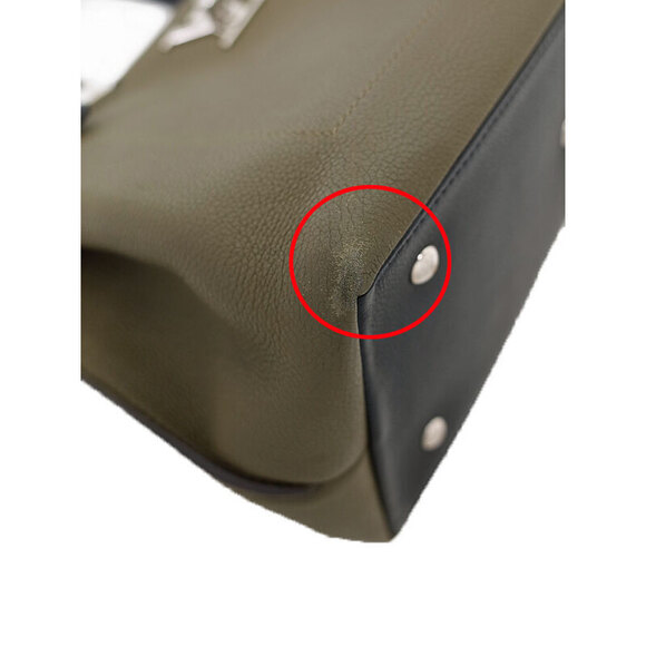 Louis Vuitton Lock Me Handbag - Picture 9 of 9